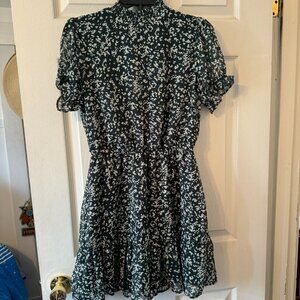 Junior's Crystal Doll green and white short sleeved mini dress. Size Medium.